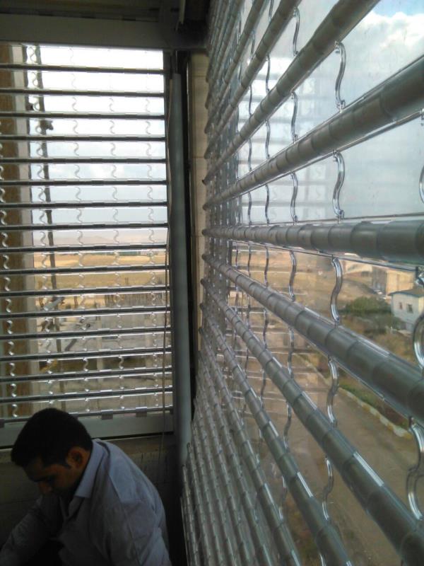 کرکره برقی  شفاف در تراس طبقه ۵
